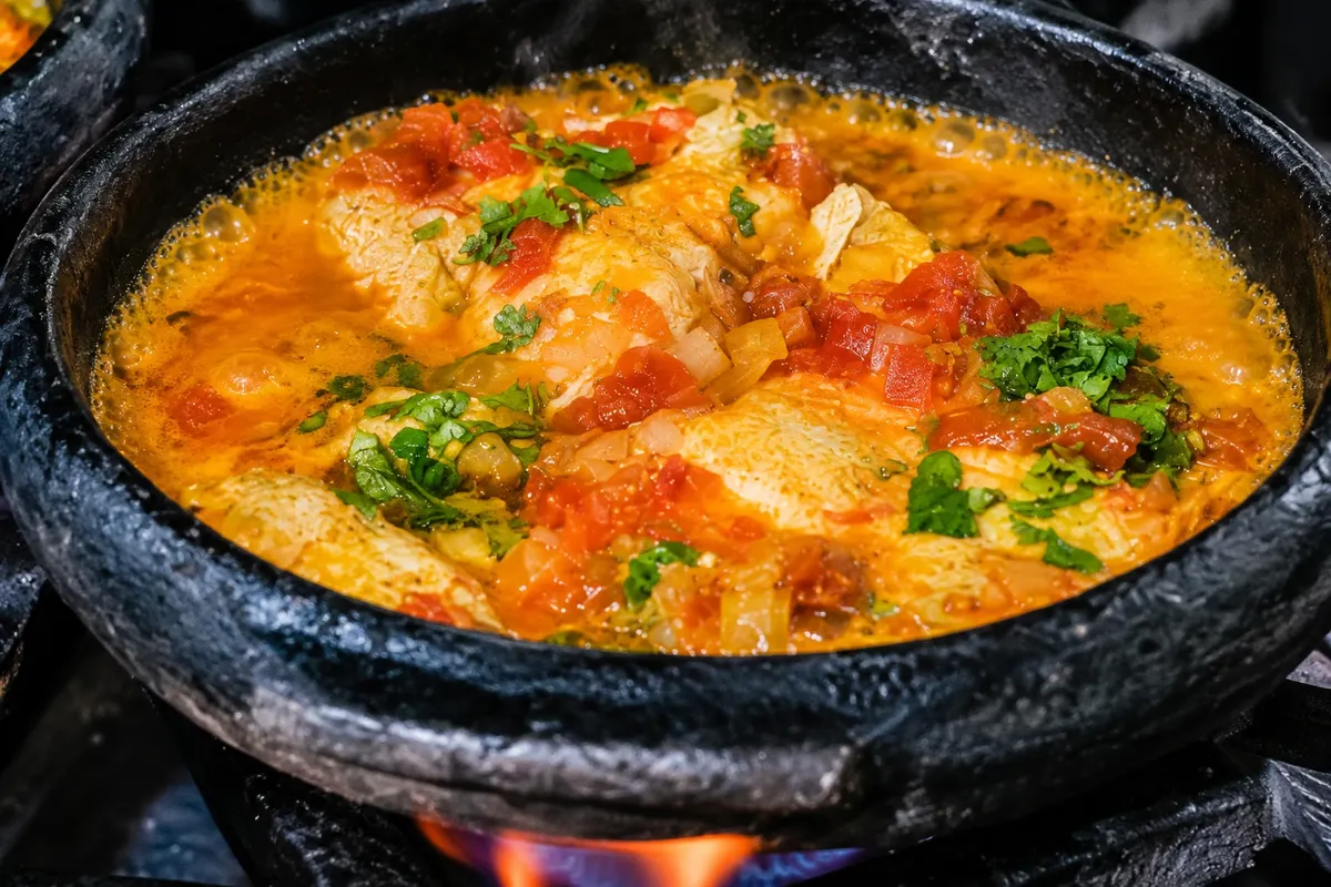 Moqueca capixaba — detalhe do alimento ou preparo.